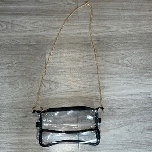 clear bag with gold strap